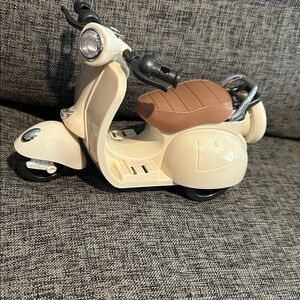 Cream and Brown Toy Scooter